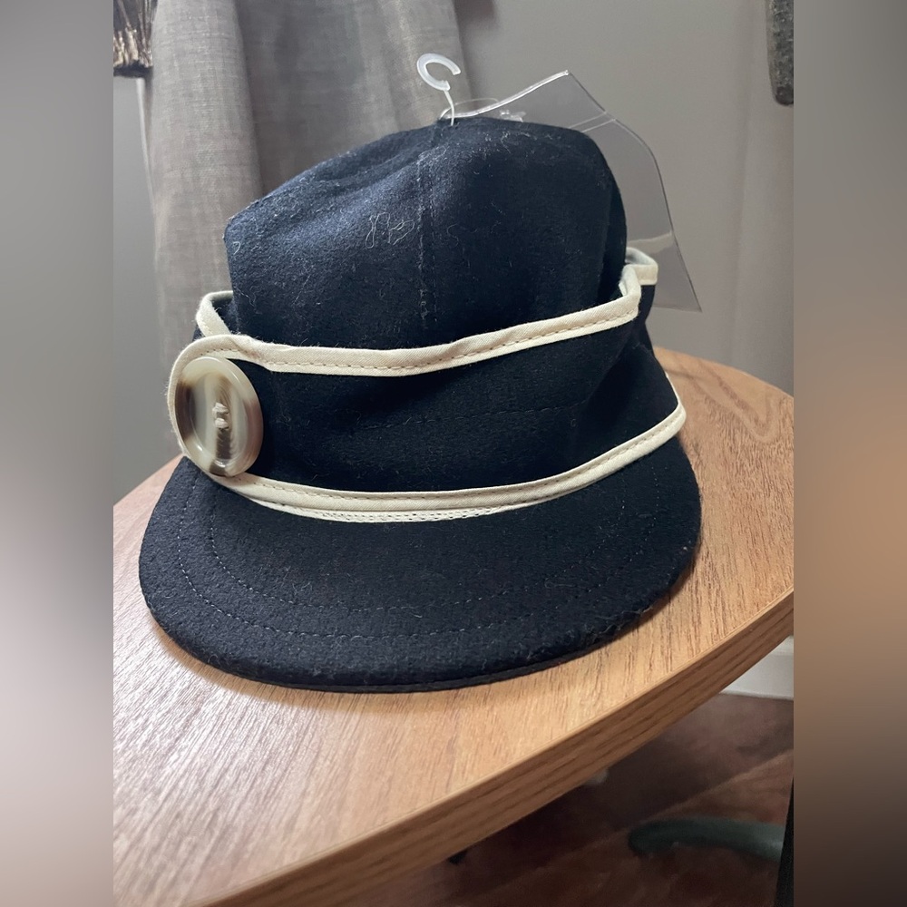 Stormy Kromer Black Hat with Cream Trim and Button. New
